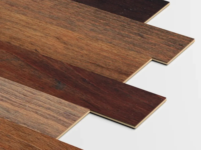 Different colors of hardwood flooring in a random length layout